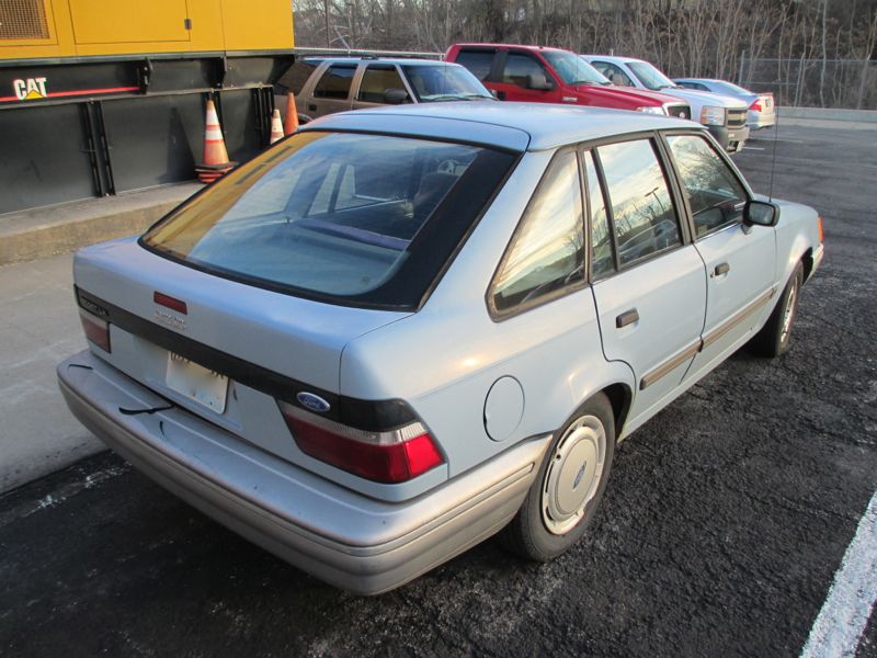 Brett purchased this Escort new in February 1990. He had just started his career a few months prior and was happily driving an early to mid-'80's Escort.